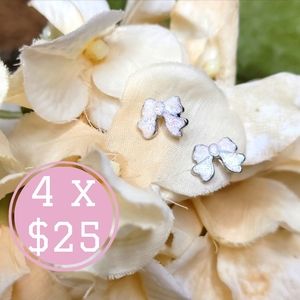 White bow earrings